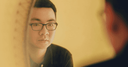 man experiencing self-doubt due to an inferiority complex