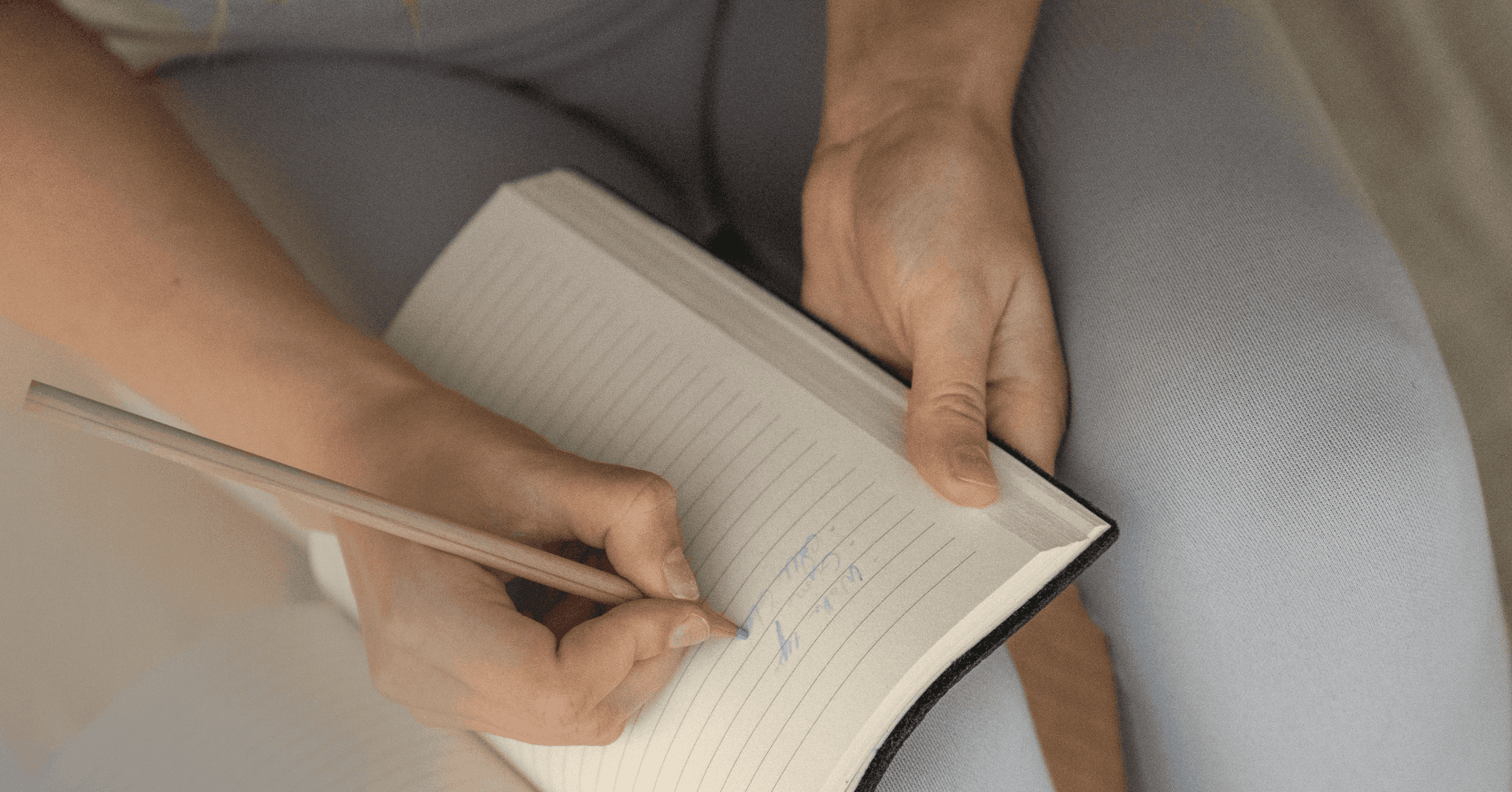 woman expressing emotions through journaling to prevent self-harming again