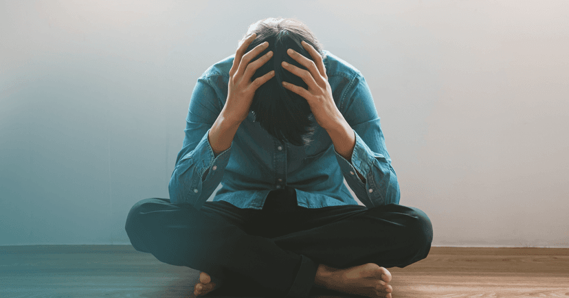 man with anxiety experiencing emotional overload