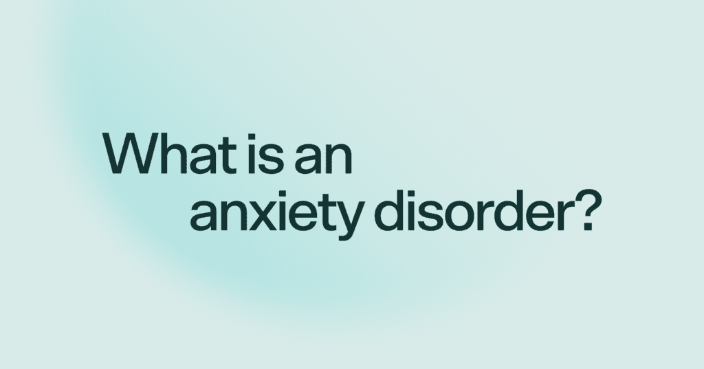 Image shows black text that says what is an anxiety disorder in the center of the screen. The text is against a blue background. The blue is a shade darker on the left side.