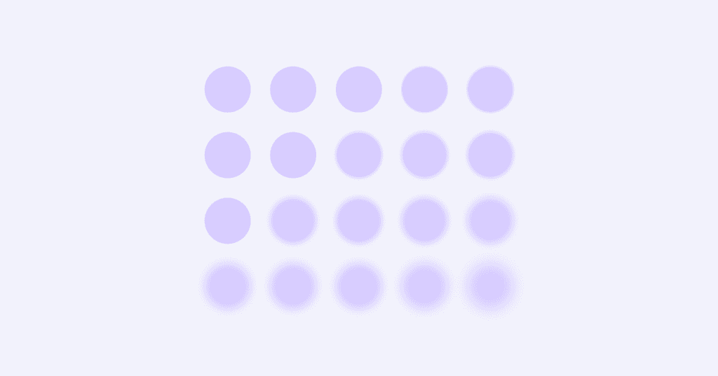 Image shows small lavender circles. The circles are all the same size in rows. On the left side of the screen, the circles are in sharp focus. On the right side, the circles are blurry.