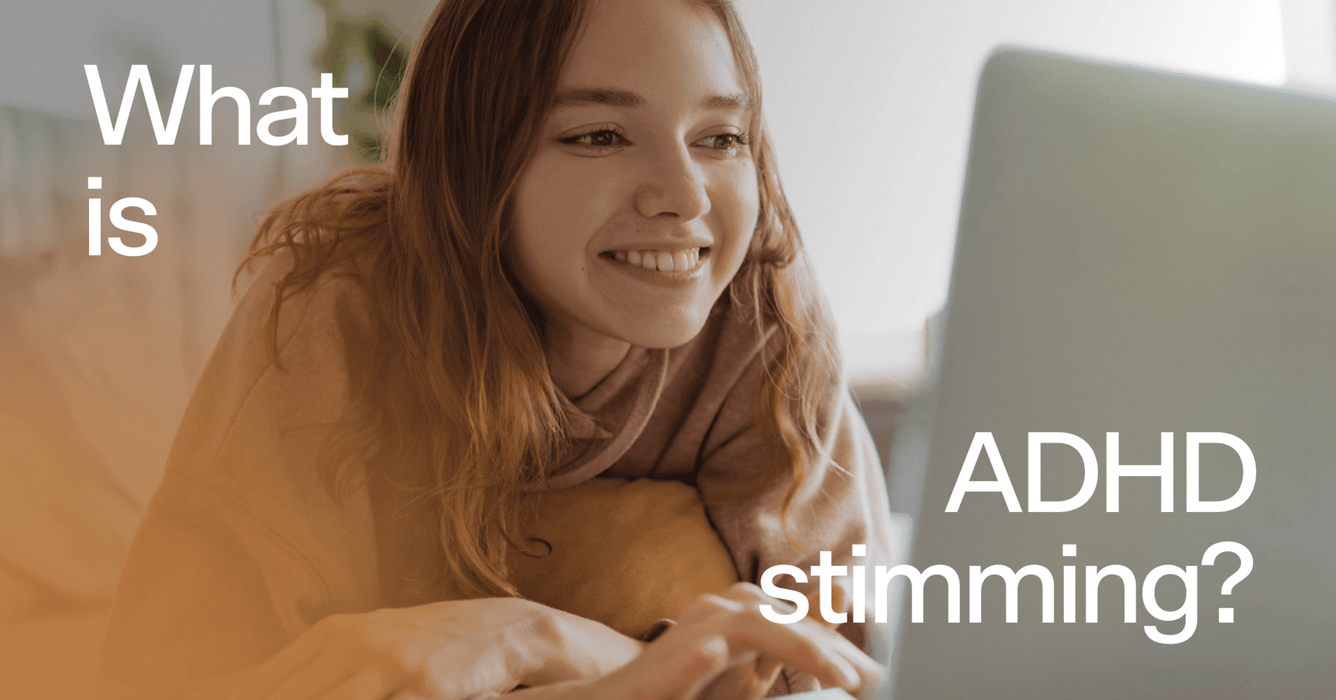 teen girl with ADHD smiling at laptop screen with text 'What is ADHD stimming?'